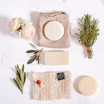 The Solids Box contains a solid face, body and shampoo bar as well as a reusable soap pouch.